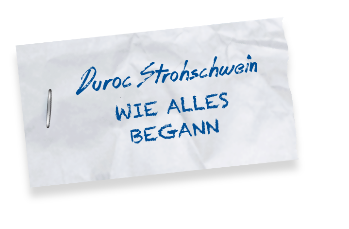Ein Zettel mit der Aufschrift "Duroc Strohschwein. Wie alles begann"