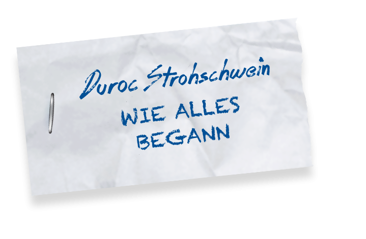 Ein Zettel mit der Aufschrift "Duroc Strohschwein. Wie alles begann"